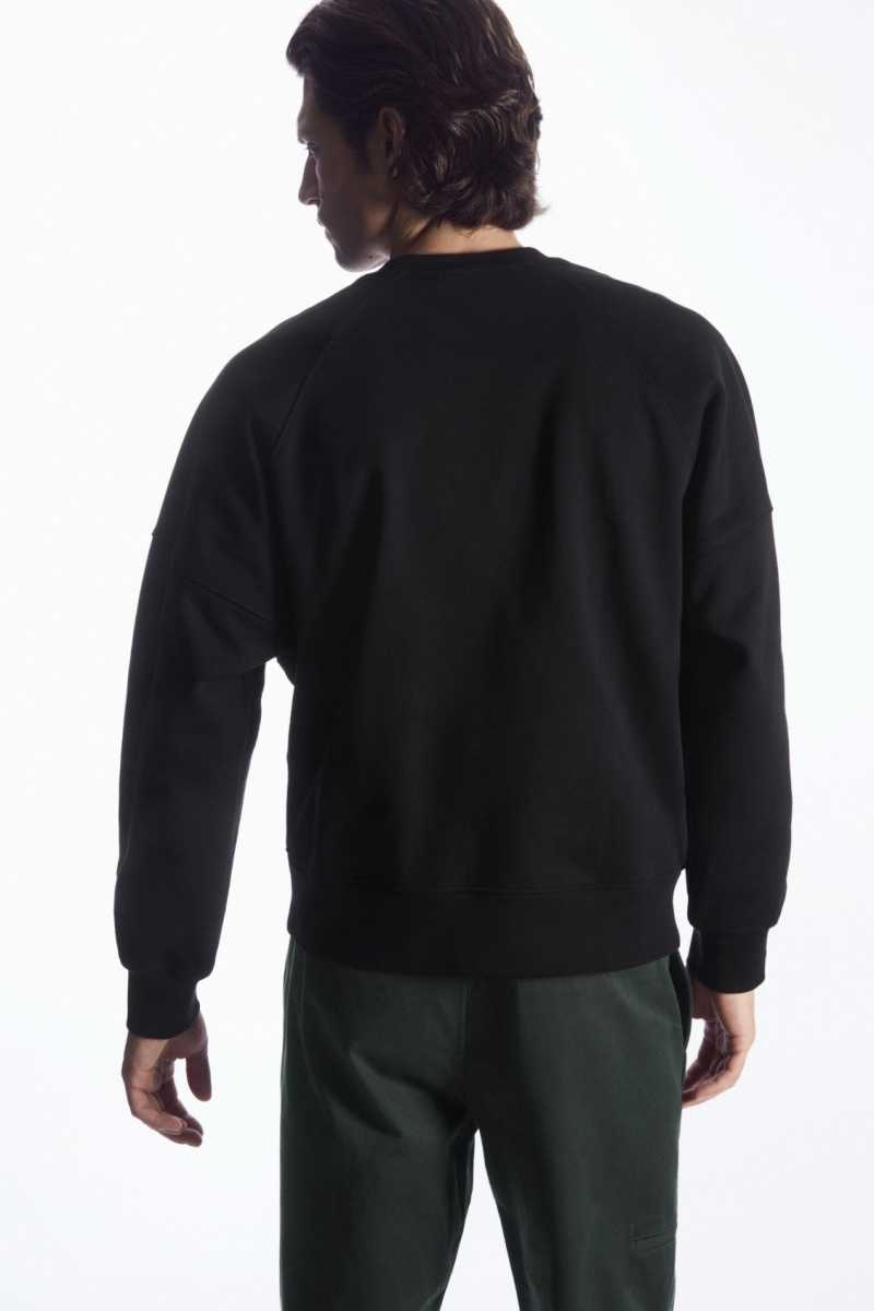 Felpe Uomo COS Oversized Exposed-Seam Nere | 3456109-EN